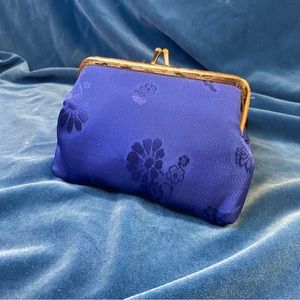 Electric blue clutch with gold tone snap closure